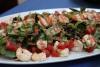 Beer Poached Vermillion Bay Sweet Shrimp over Mixed greens